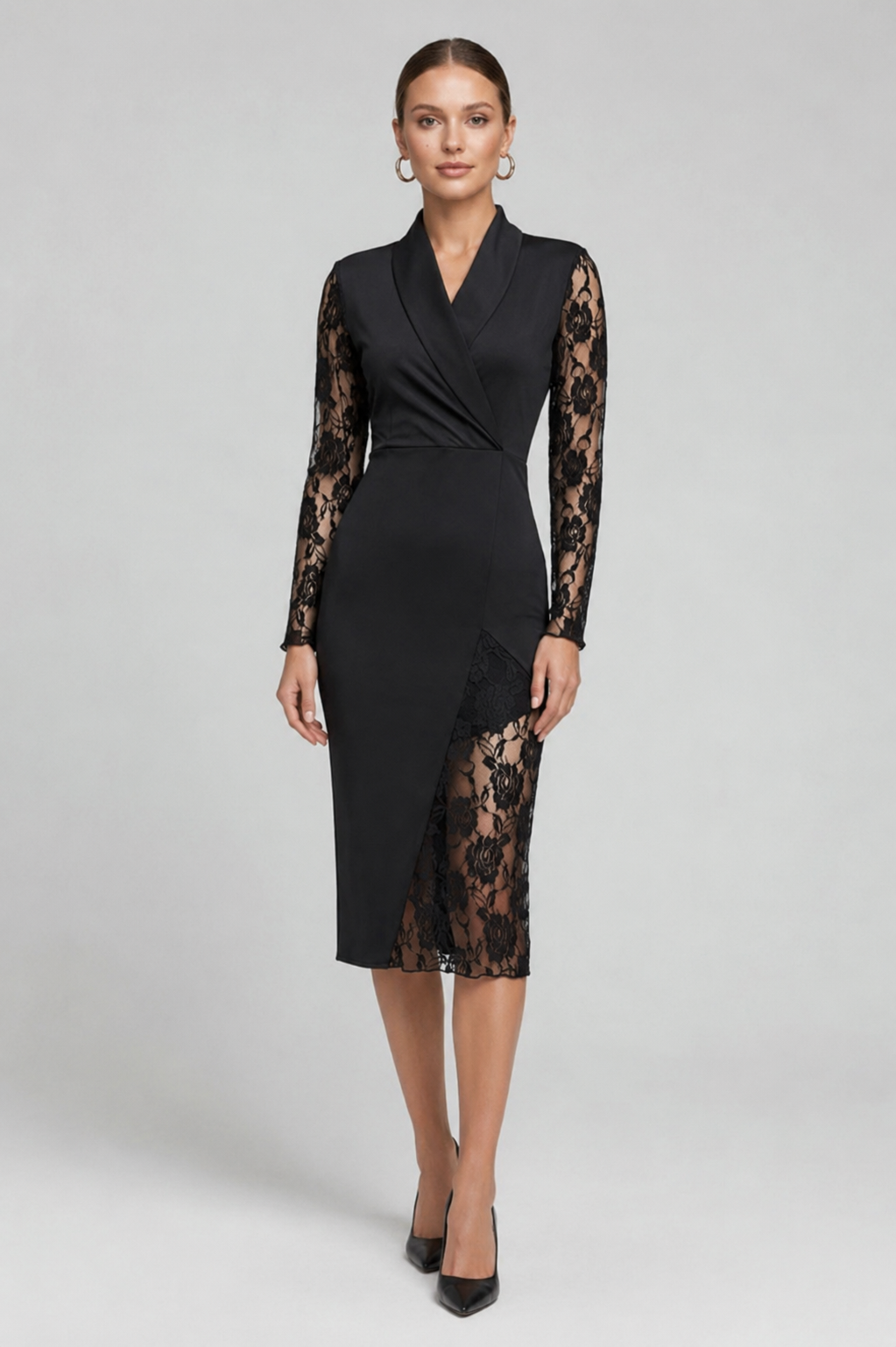 Black dress with lace sleeves on a gray background
