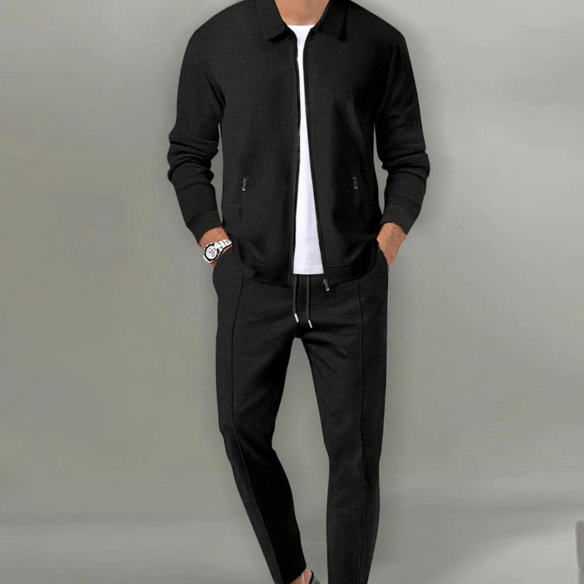 Men's slim-fit zip-up tracksuit set in black with waffle texture