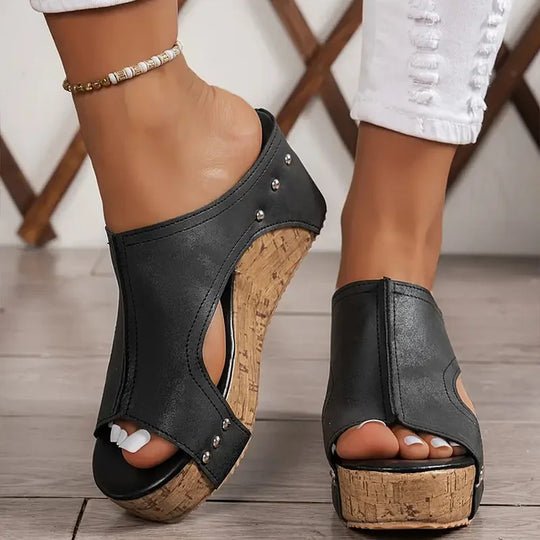 Women's black cork wedge sandals with adjustable straps