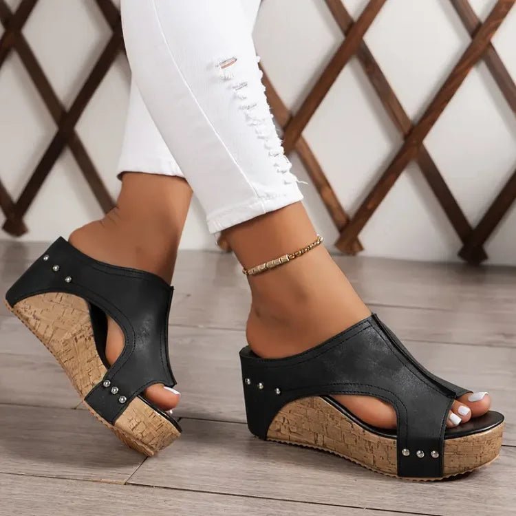 Women's black cork wedge sandals with adjustable straps