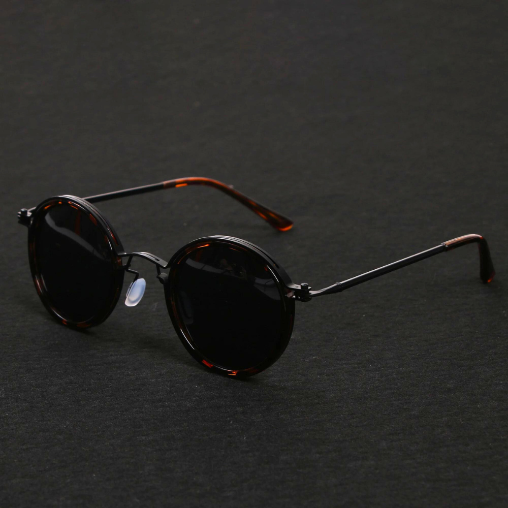 silver round metal-frame sunglasses with dark lenses