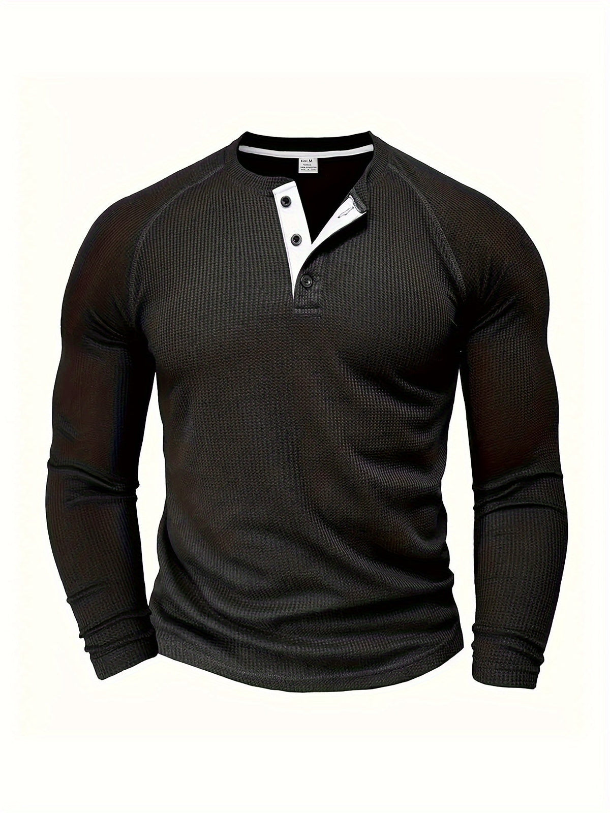 Long sleeve raglan Henley shirt in black, featuring raglan sleeves and a button placket.