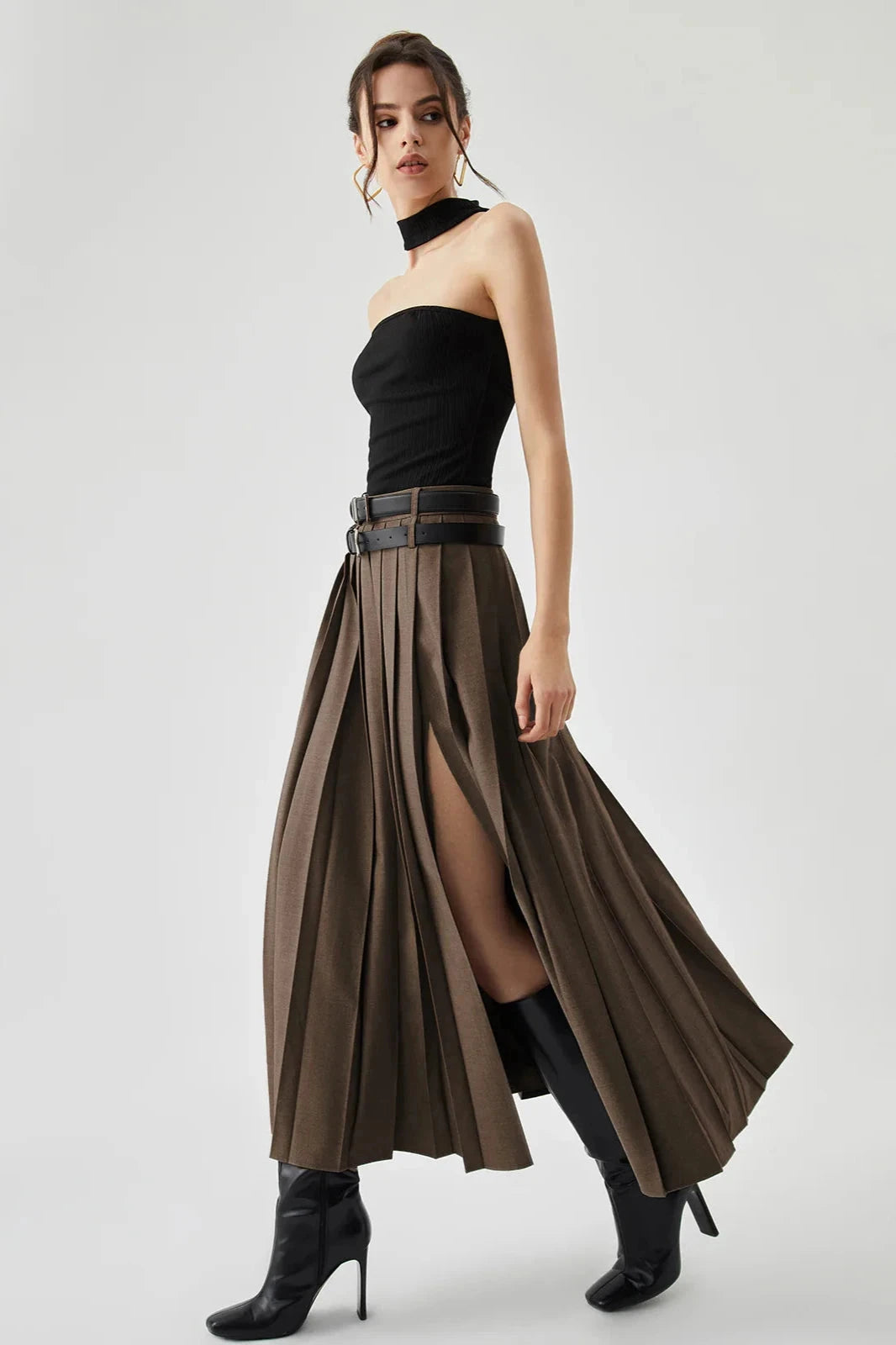 Women's brown pleated maxi skirt with a side split
