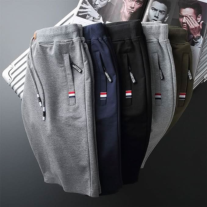 Men's white knee-length jersey shorts with zip pockets
