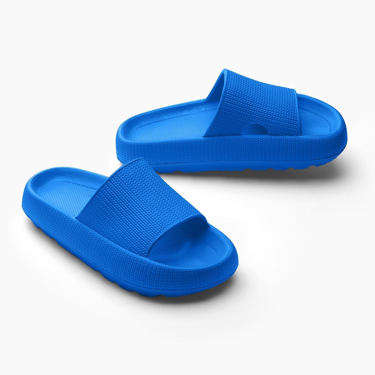 Women's blue cushioned cloud slides with thick sole