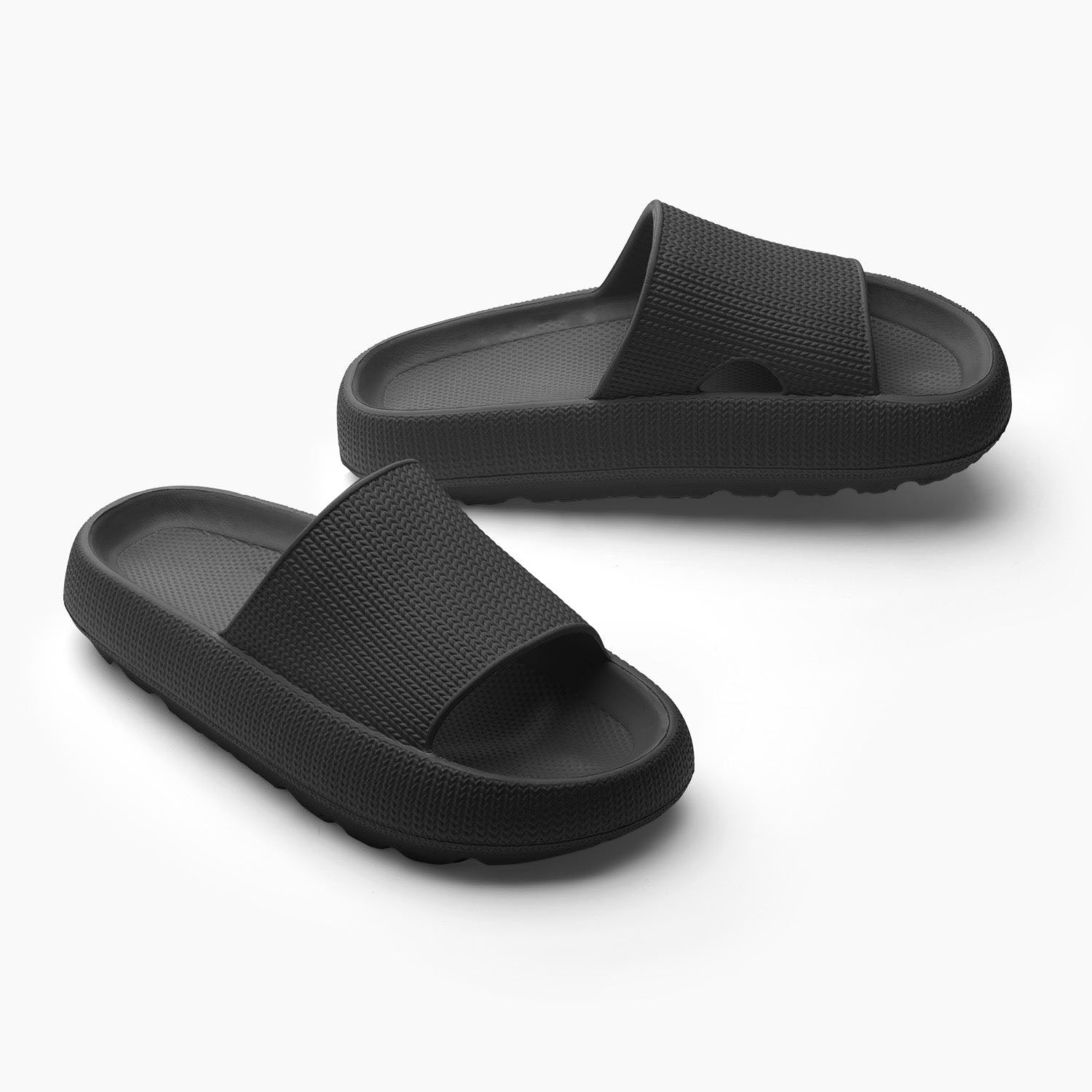 Women's black cushioned cloud slides with thick sole