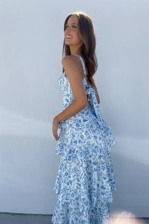 Women's pink floral maxi dress with a tiered ruffle skirt