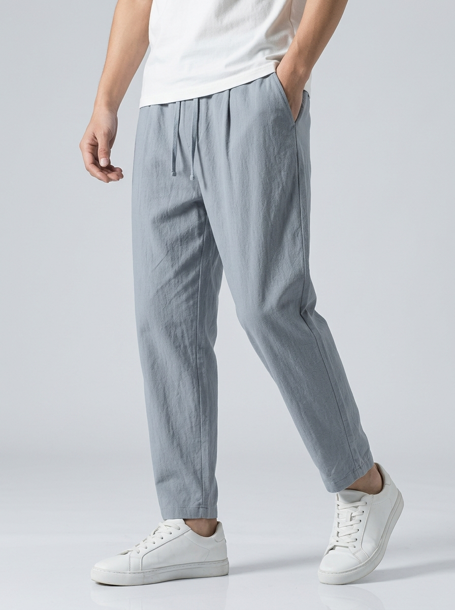 Men's light brown relaxed-fit linen trousers with drawstring
