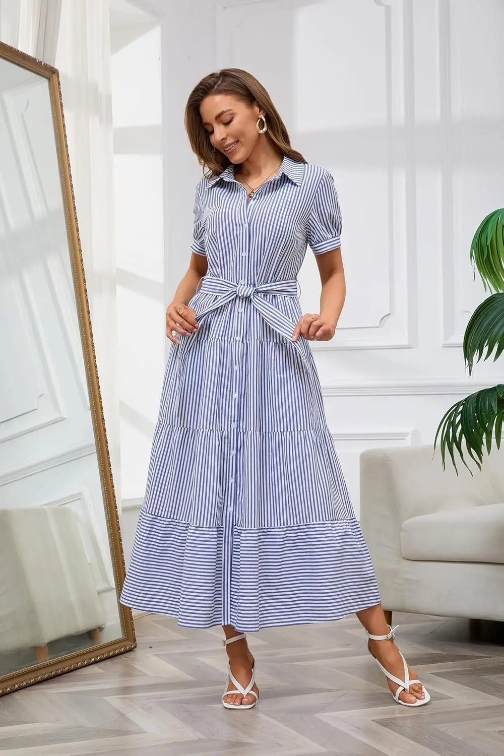 Women's blue striped maxi dress with tiered hem and tie waist