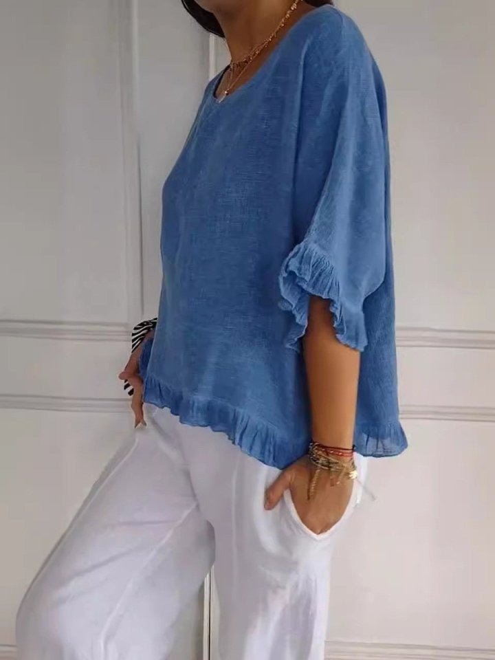 Women's blue frayed edge blouse with three-quarter sleeves