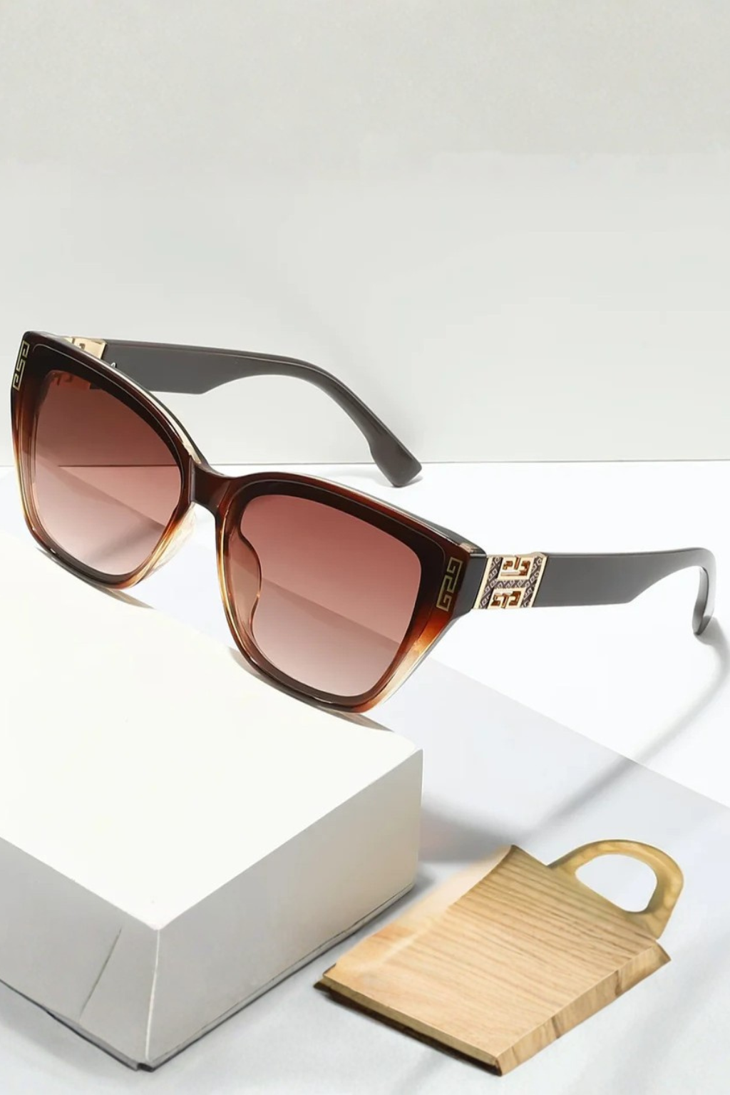 Women's cat eye sunglasses with gradient lenses and gold detail