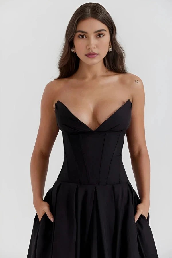 Women's white corset midi dress with a structured bodice and full skirt