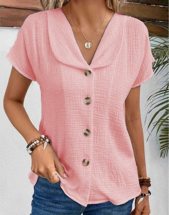 Women's white collared button-up blouse in textured fabric