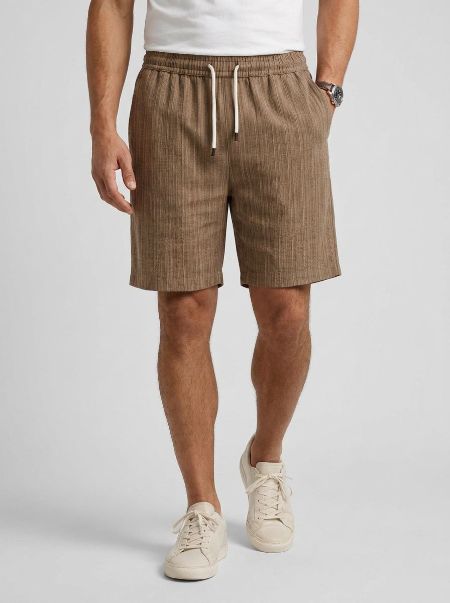 Men's light blue linen shorts with elastic waist and drawstring