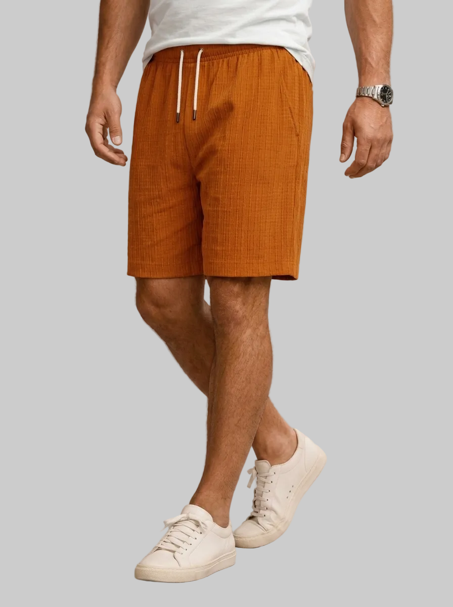 Men's light blue linen shorts with elastic waist and drawstring