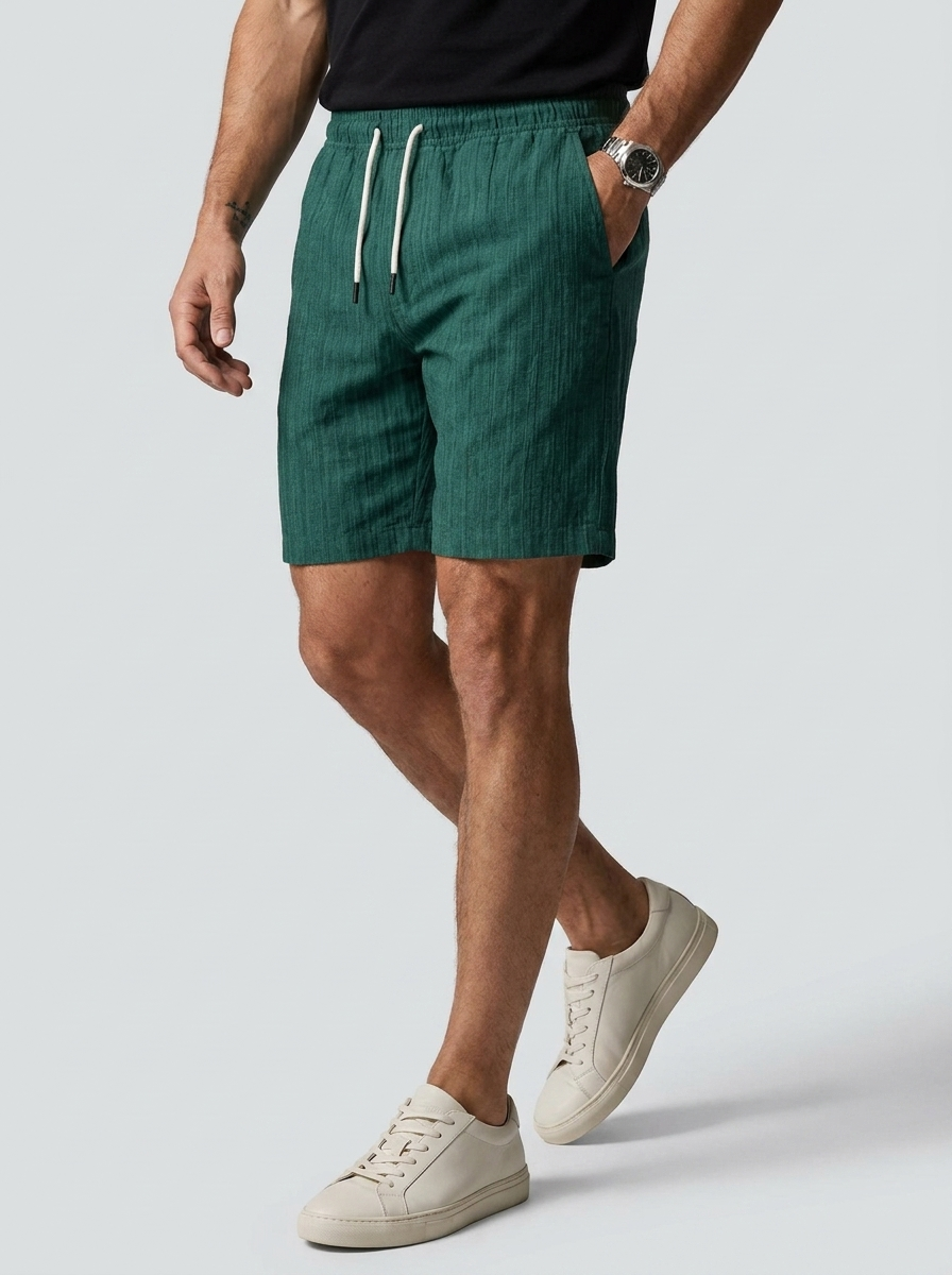 Men's white linen shorts with elastic waist and drawstring