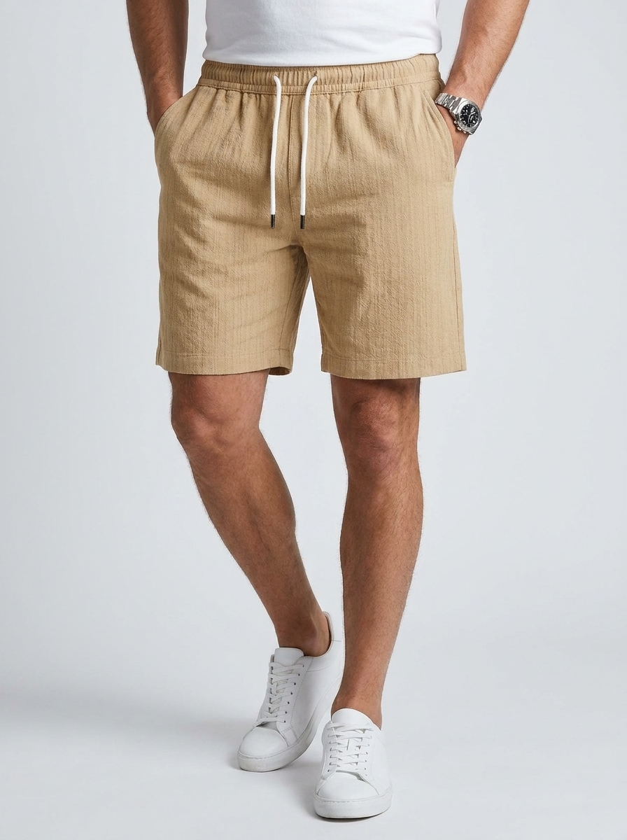 Men's light blue linen shorts with elastic waist and drawstring