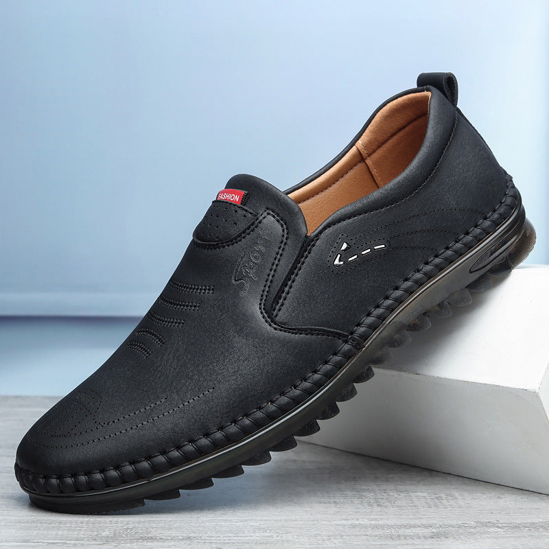 Men's black slip on leather loafers with moccasin stitch detail