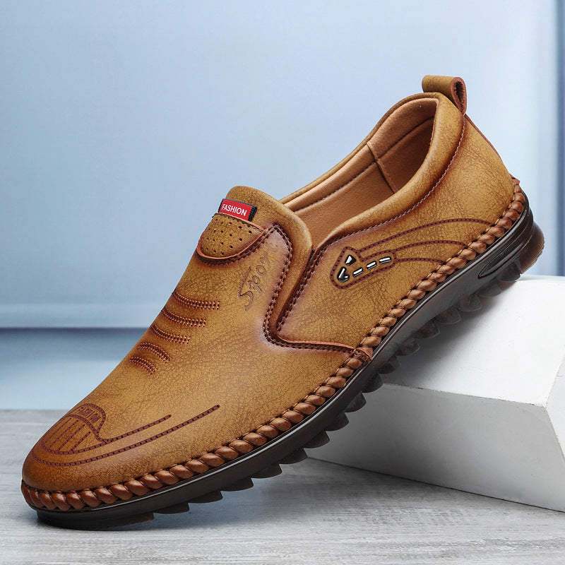 Men's black slip on leather loafers with moccasin stitch detail