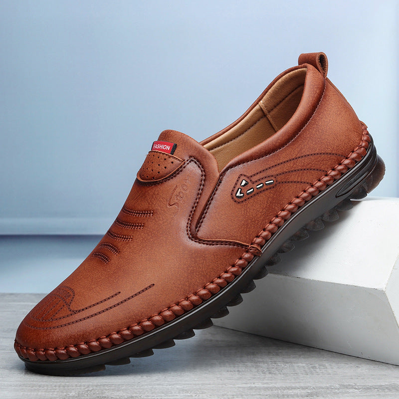 Men's black slip on leather loafers with moccasin stitch detail