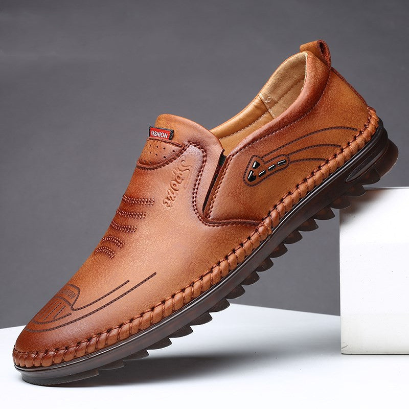 Men's brown slip on leather loafers with moccasin stitch detail