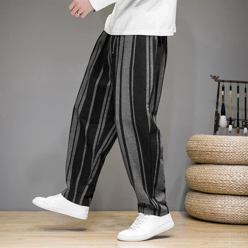 Men's black striped cropped trousers with wide leg and drawstring waist