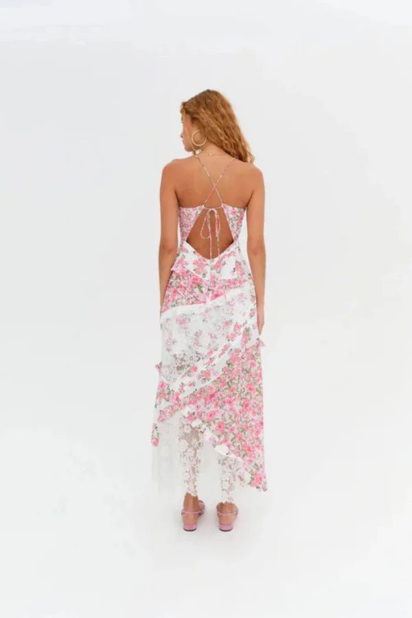 Women's pink floral maxi dress with a plunging neckline and ruffles