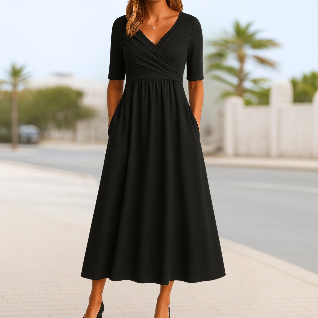 Women's navy blue wrap-style midi dress with cross front and short sleeves