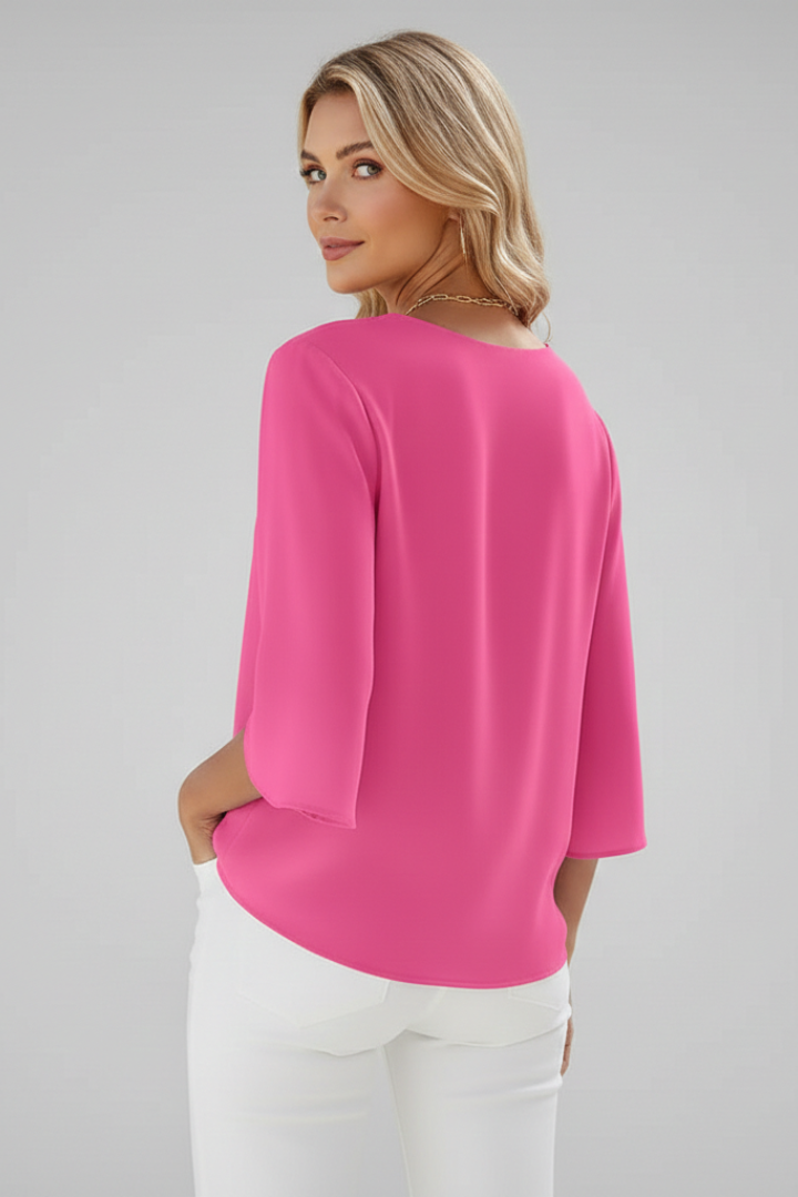 Women's pink short sleeve blouse with V-neck and chest pocket