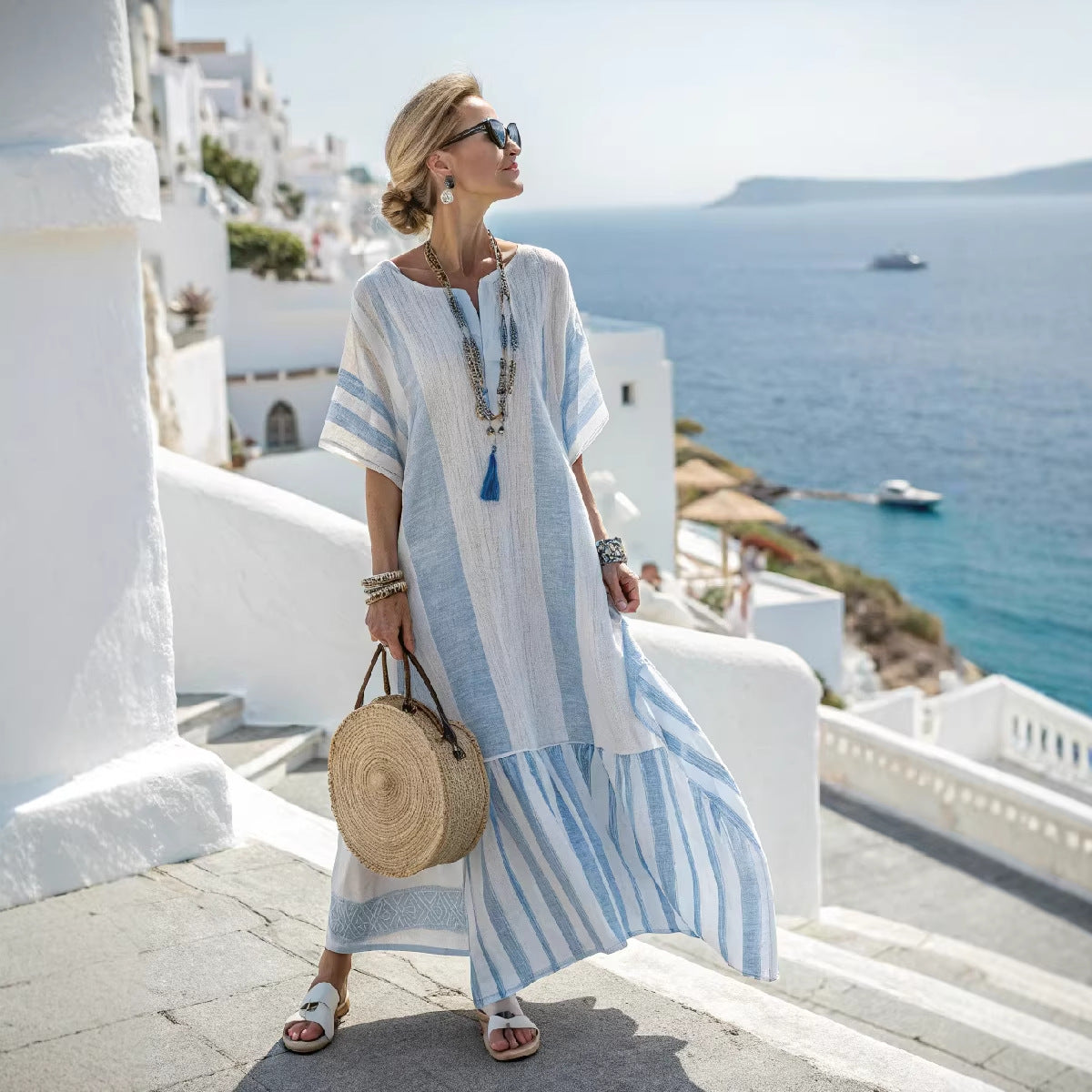 Women's light blue boho kaftan maxi dress with batwing sleeves and fringe hem