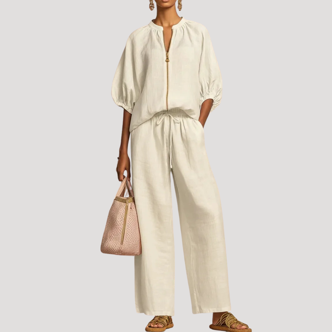 Women's light blue linen co-ord set with balloon sleeve top and wide leg trousers