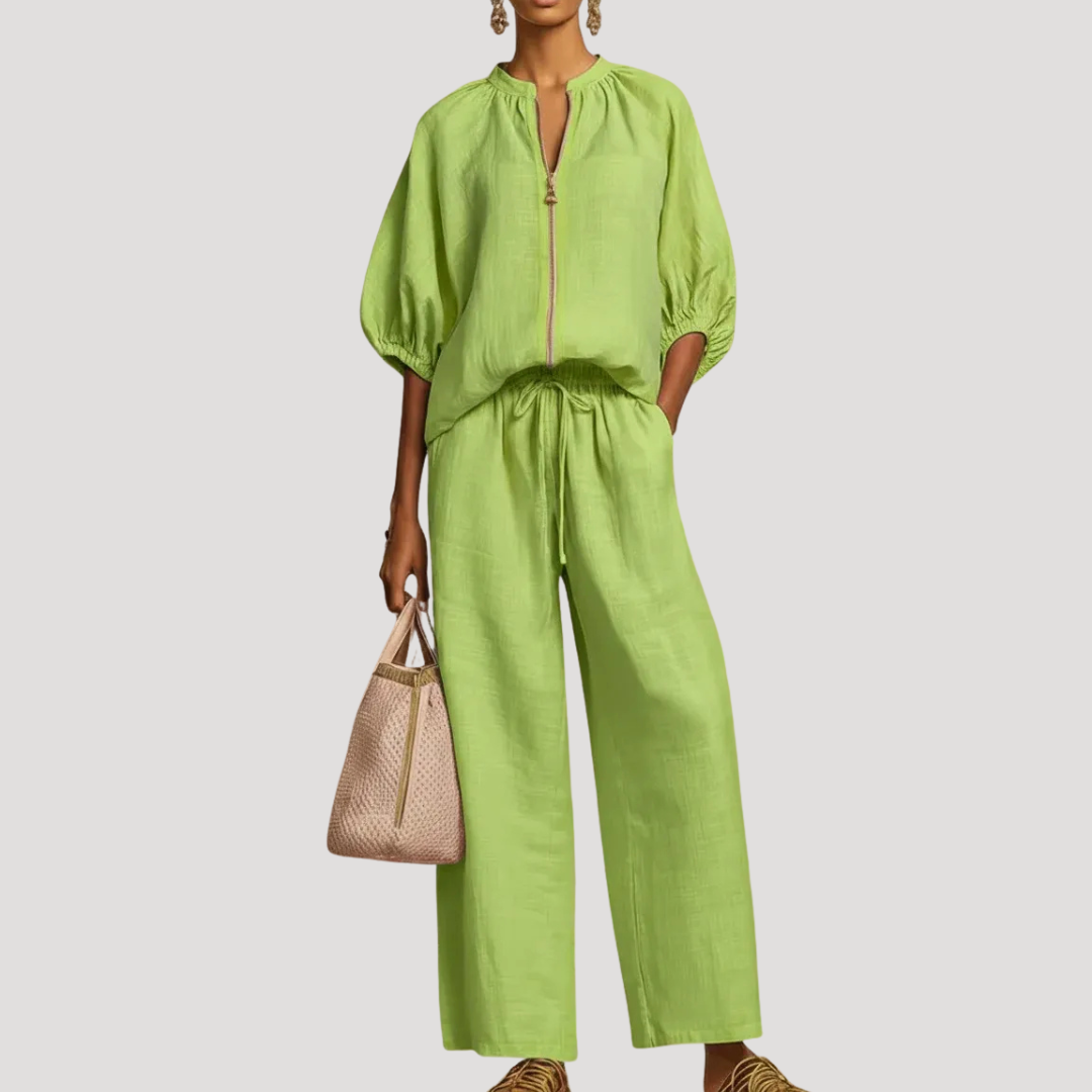 Women's light blue linen co-ord set with balloon sleeve top and wide leg trousers