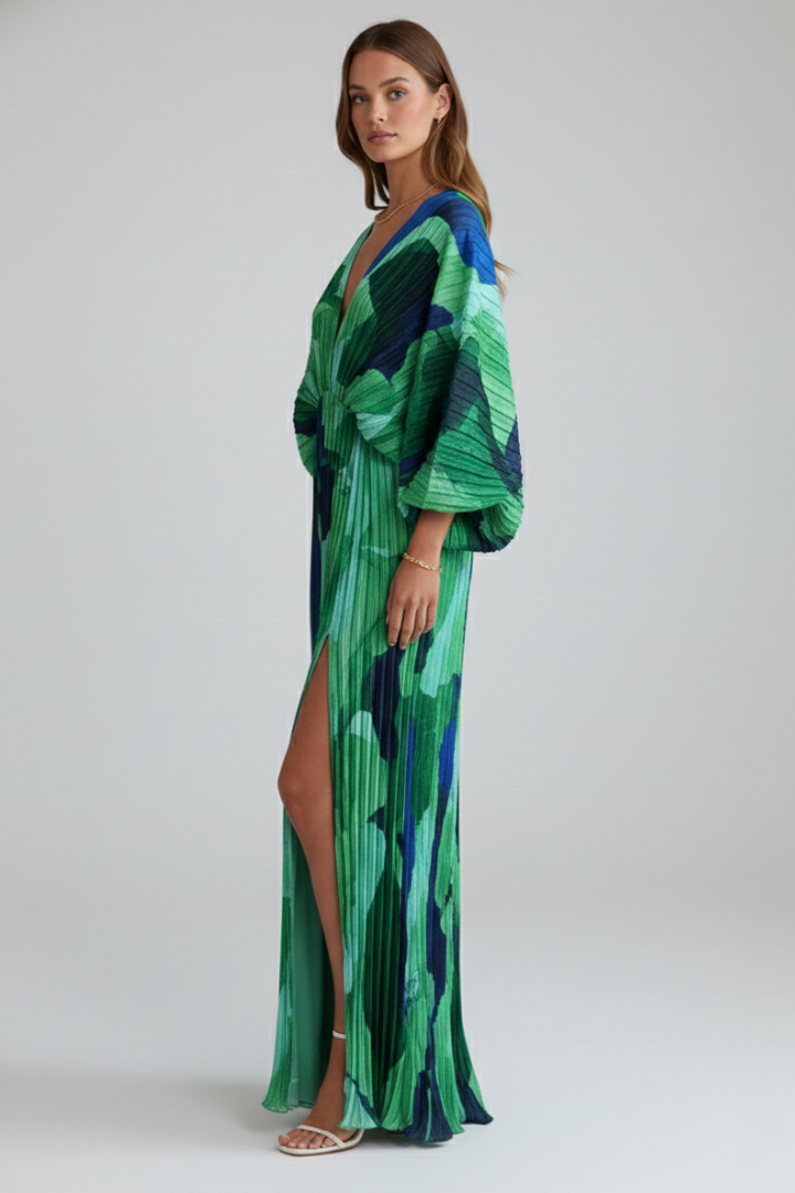 Women's green printed maxi dress with pleated skirt and side slit