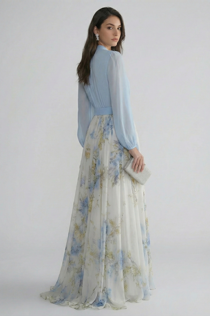 Women's light blue floaty maxi dress with sheer sleeves and V-neckline