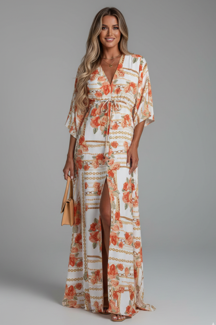 Women's pink kaftan-style printed maxi dress with batwing sleeves
