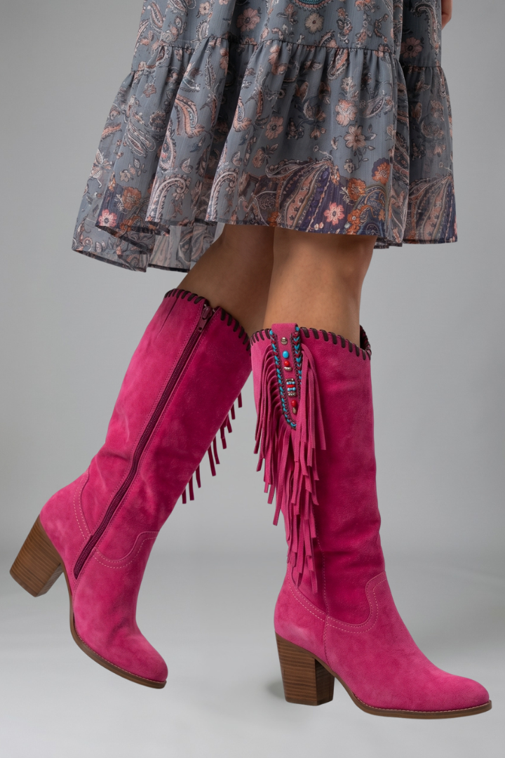 Women's pink western boots with fringe trim and studded block heel detailing