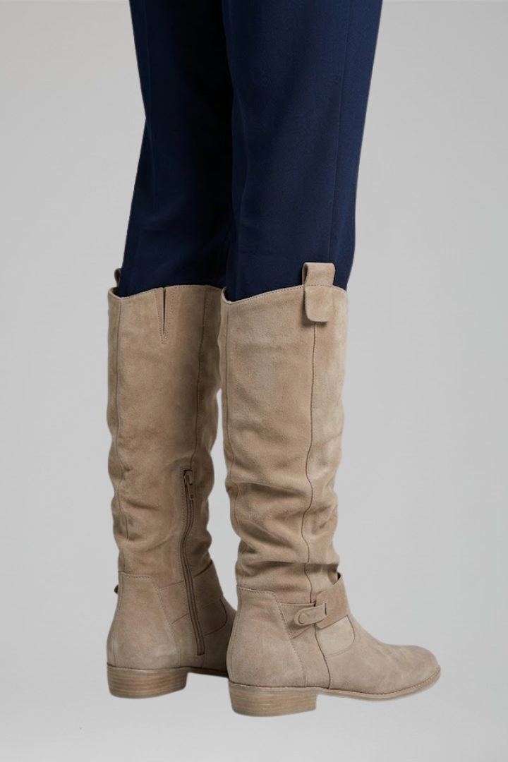 Women's beige knee-high boots with side zip closure and faux suede finish
