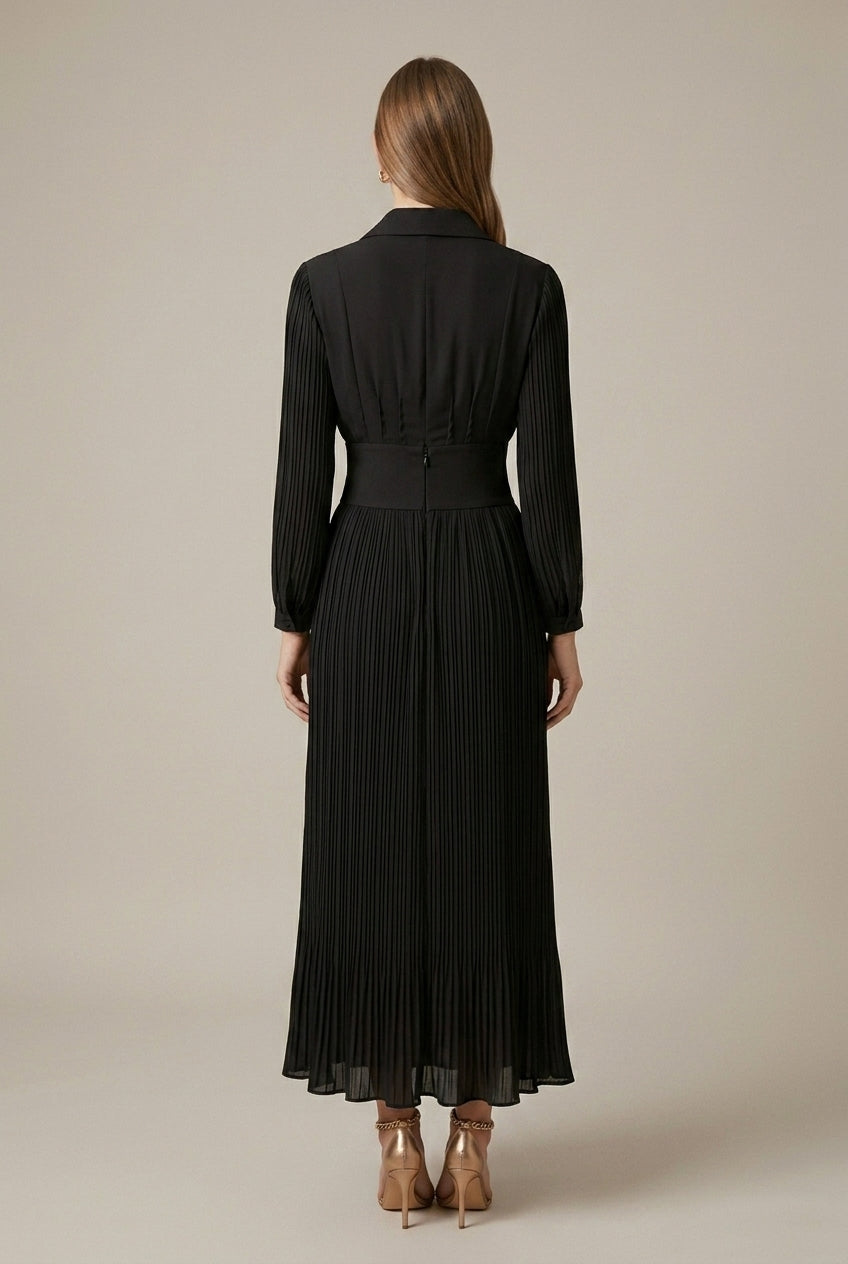 Women's black pleated maxi dress with V neck and button waist