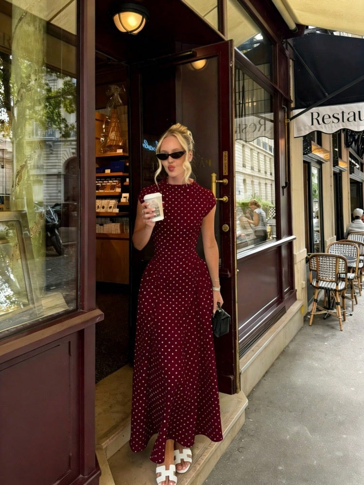 Women's pink polka dot maxi dress with cap sleeves and high neck