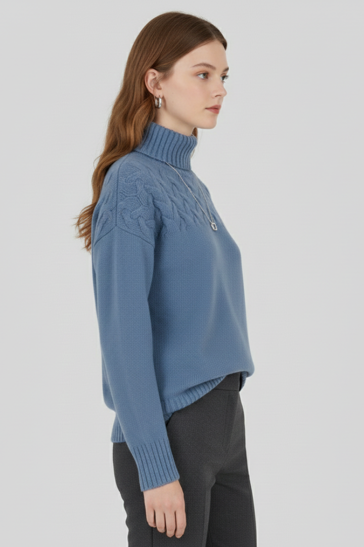 Women's sky blue turtleneck cable knit jumper with ribbed cuffs and hem