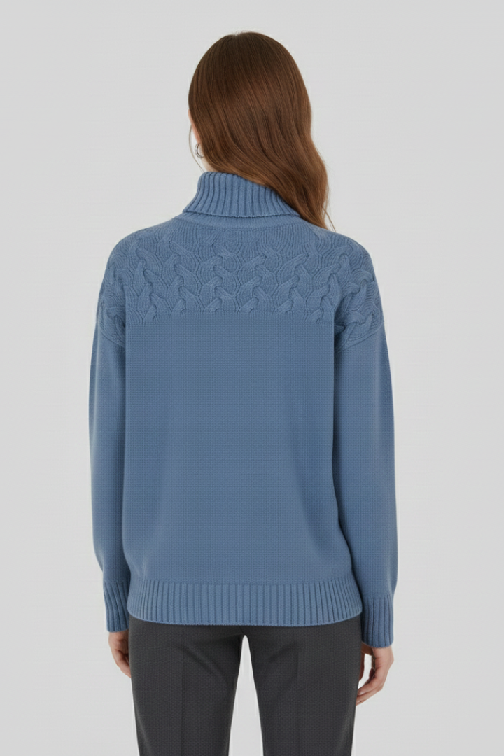 Women's sky blue turtleneck cable knit jumper with ribbed cuffs and hem