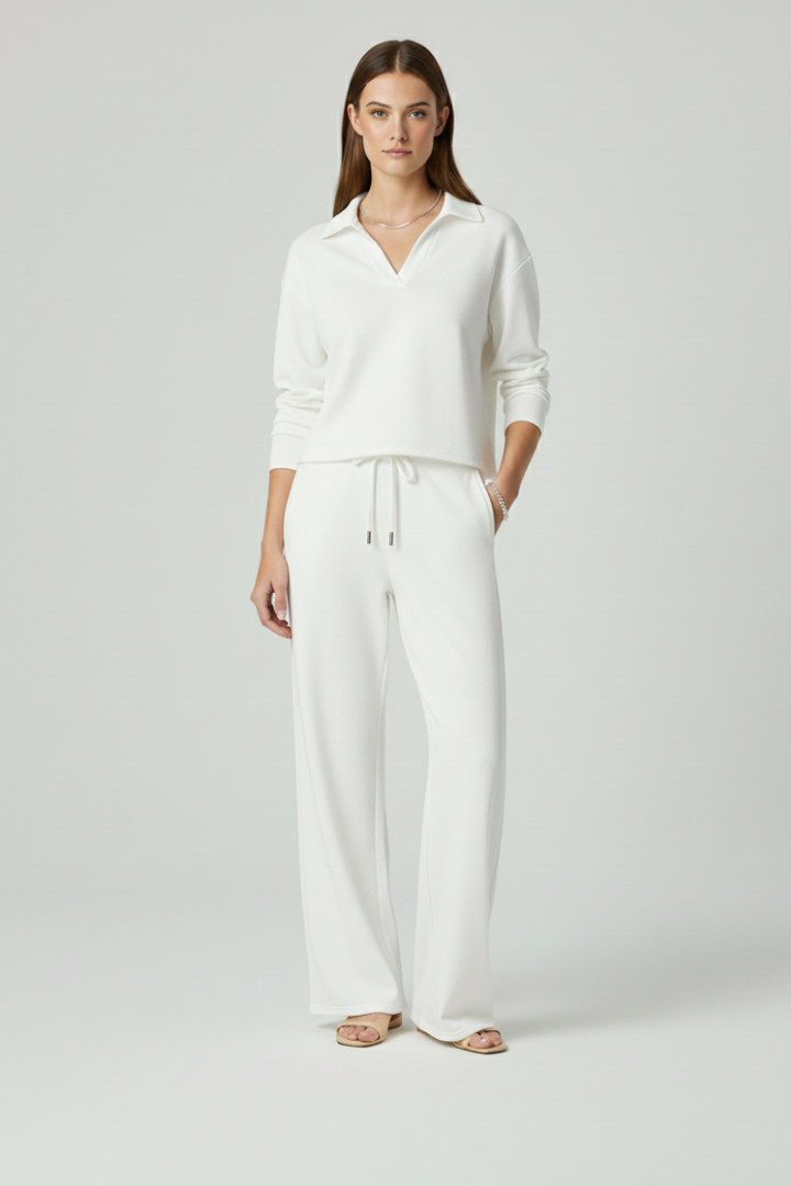 Women's black v-neck top and wide-leg trousers co-ord set for everyday wear