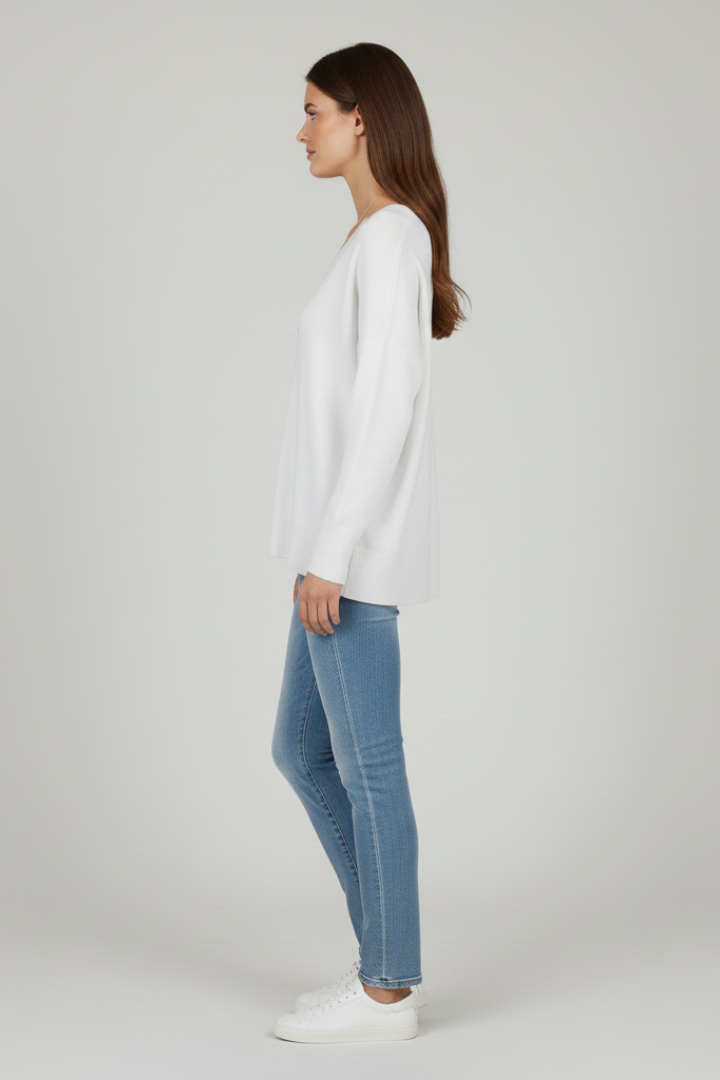 Women's white V-neck jumper with dropped shoulders and a straight hem