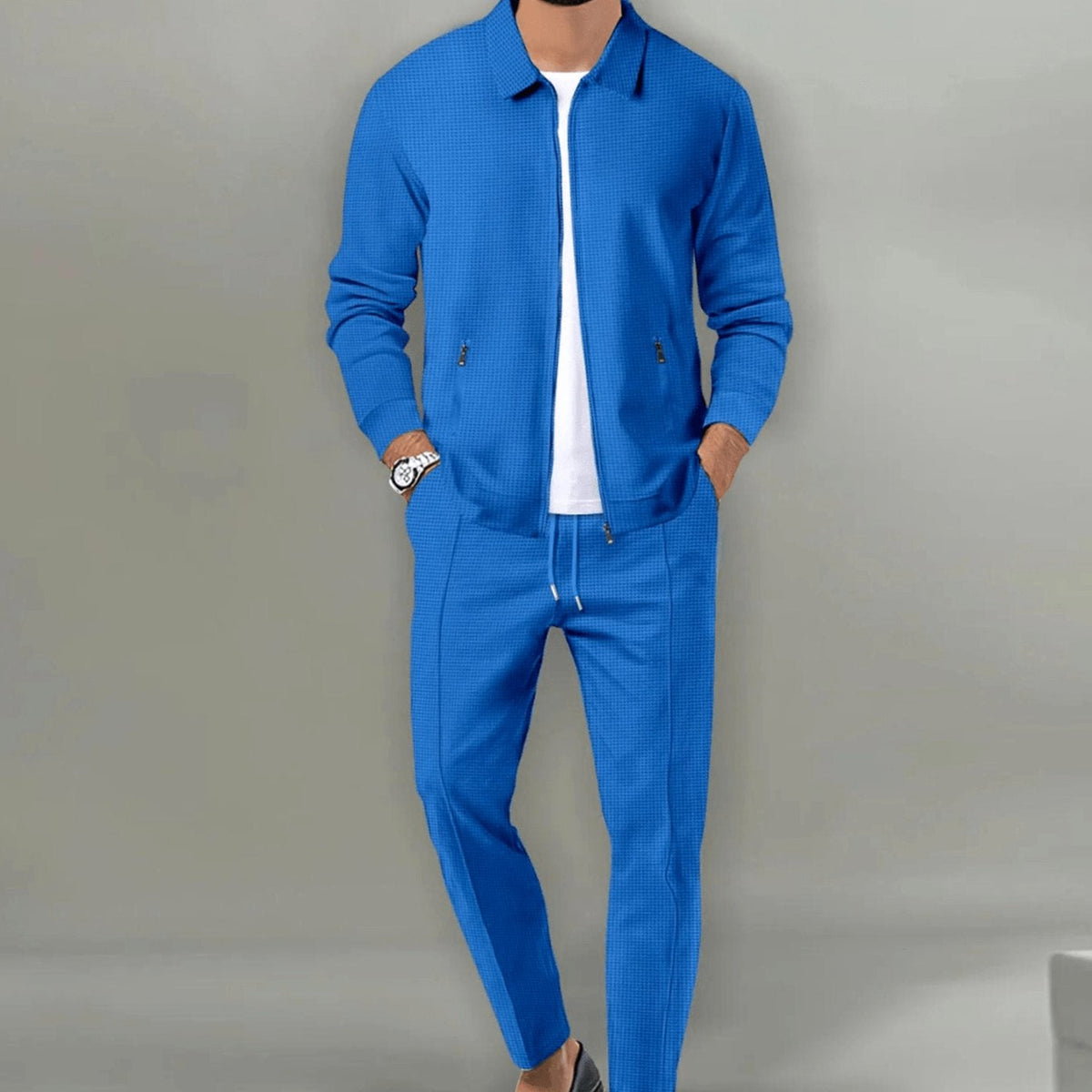 Men's slim-fit zip-up tracksuit set in blue with waffle texture