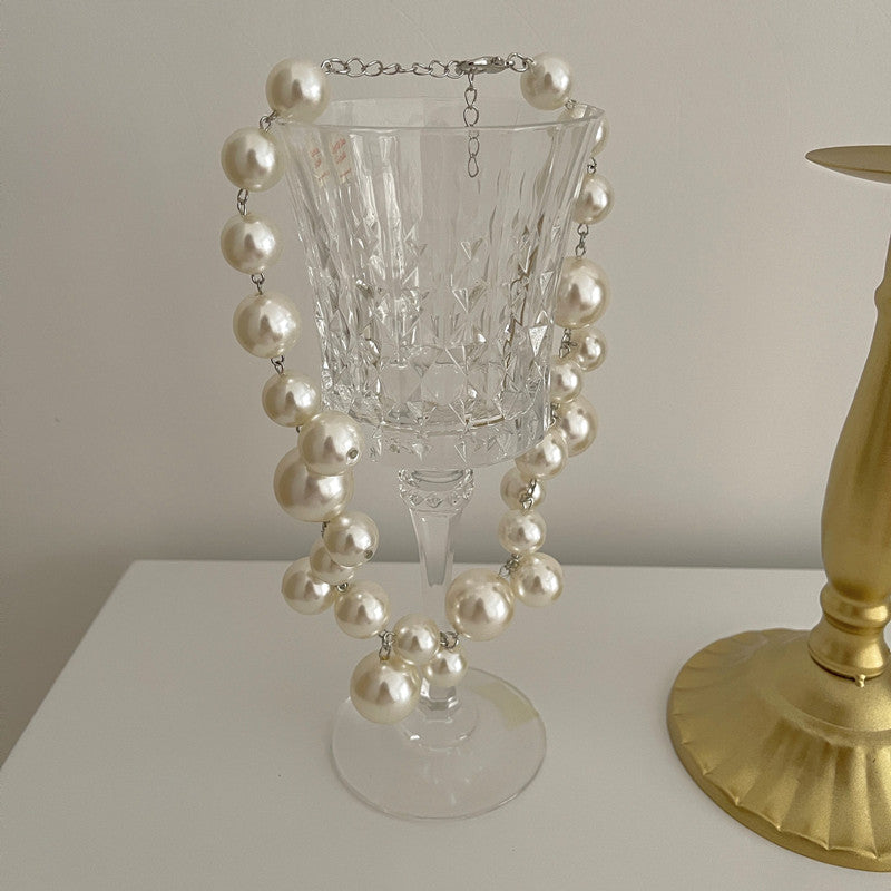 Women's chunky pearl statement necklace with graduated beads