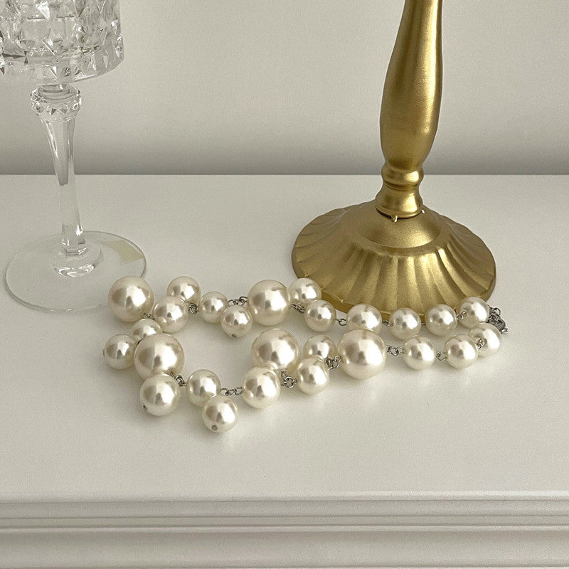 Women's chunky pearl statement necklace with graduated beads