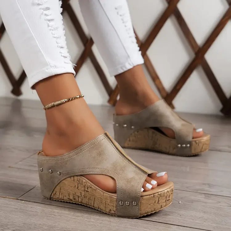 Women's black cork wedge sandals with adjustable straps