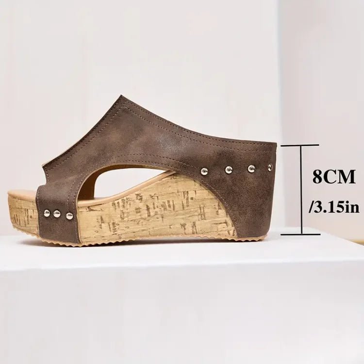 Women's black cork wedge sandals with adjustable straps