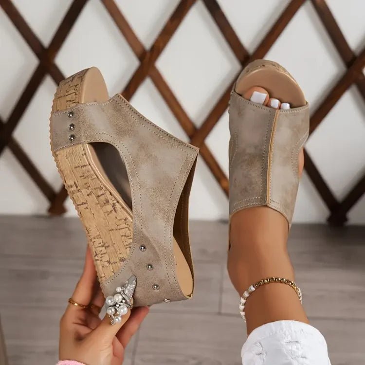 Women's black cork wedge sandals with adjustable straps