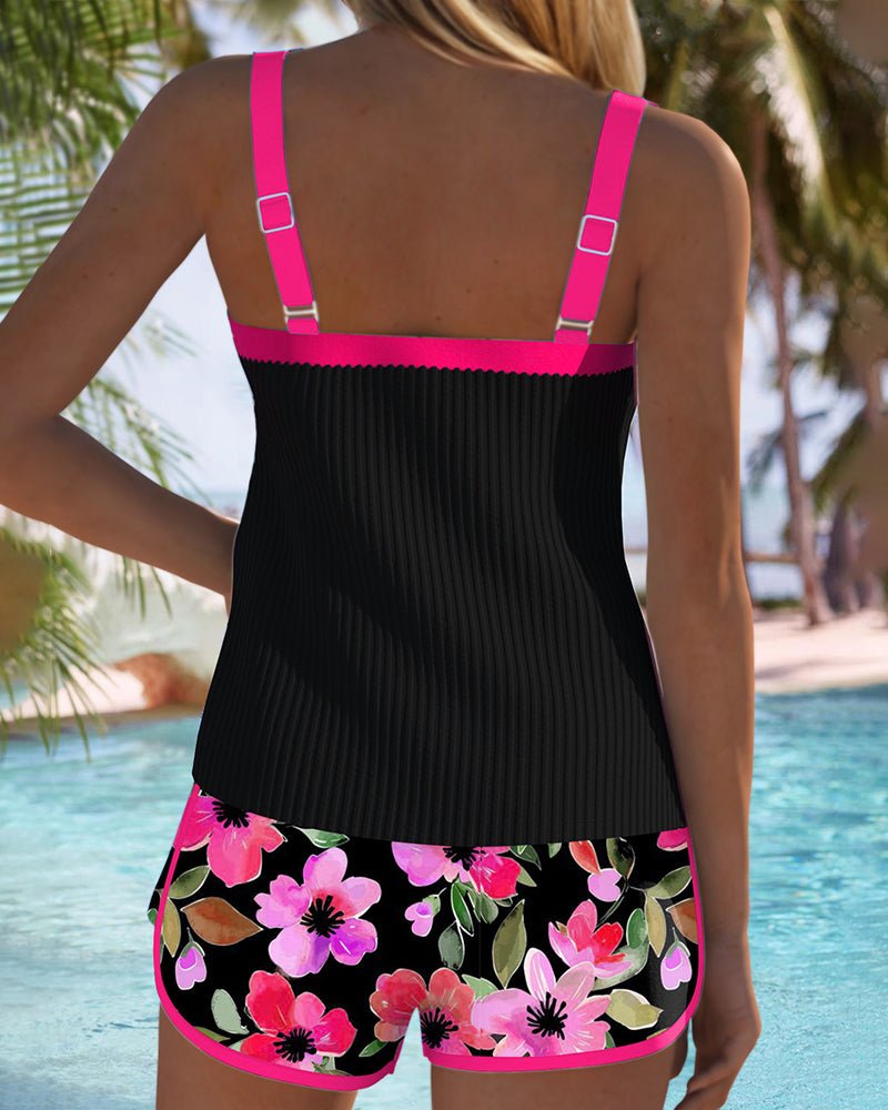 Women's orange tummy control tankini set with floral print shorts
